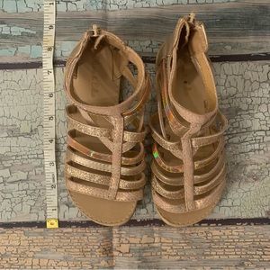 Beautiful brown and gold shiny sandals for a little girl in excellent condition.
